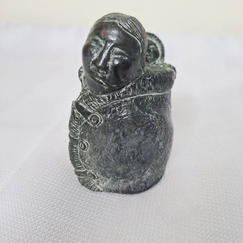 The Wolf Sculpture brand "The Inuit Woman and Child"  Resin sculpture.